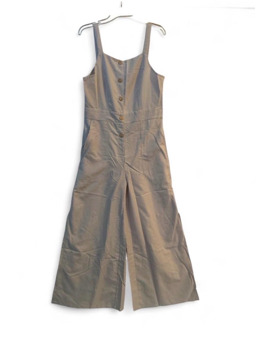 Chic Sleeveless Button-Front Wide-Leg Jumpsuit/Overalls in Beige with pockets.